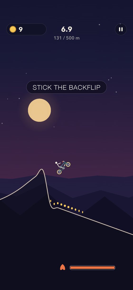 Mid air backflip over a ridge under a full moon