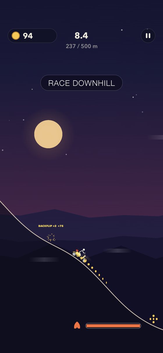 Riding down a steep slope at speed, collecting coins